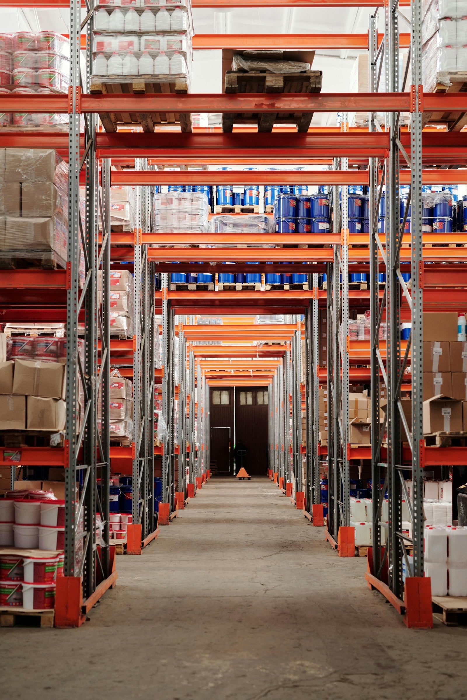 Warehouse aisle representing Michelon Supplies commercial lighting products