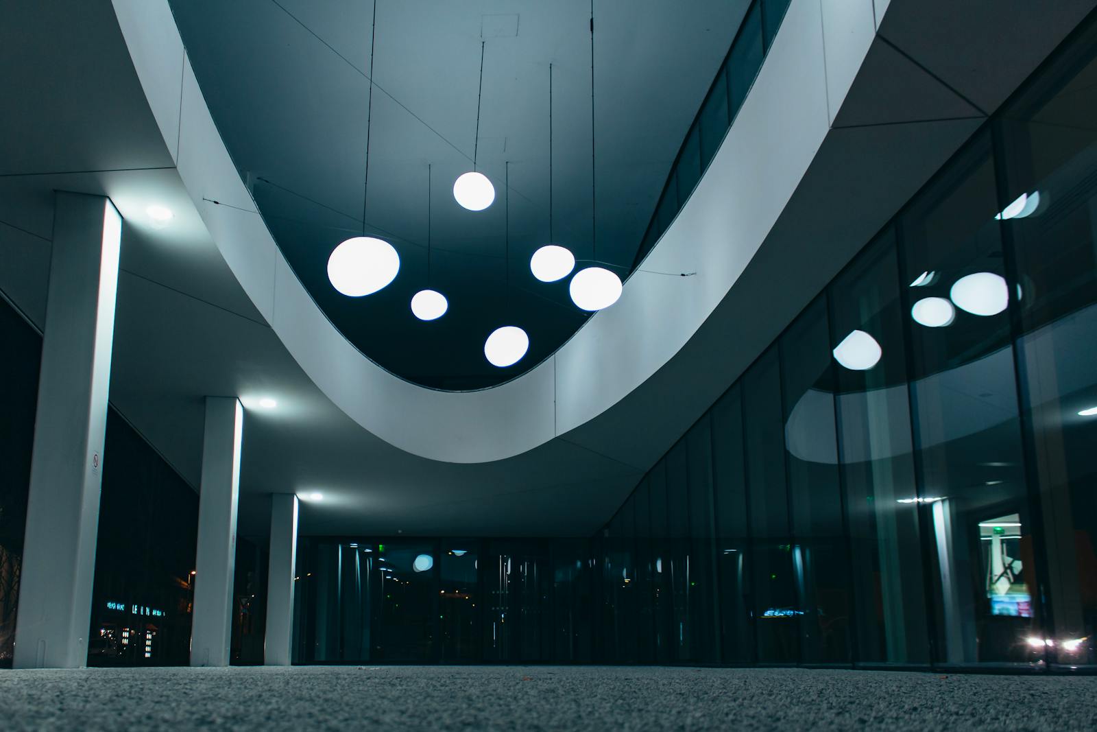 Modern office interior with illuminated ceiling lights